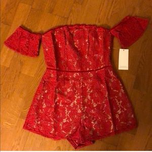 Red off shoulder lace romper